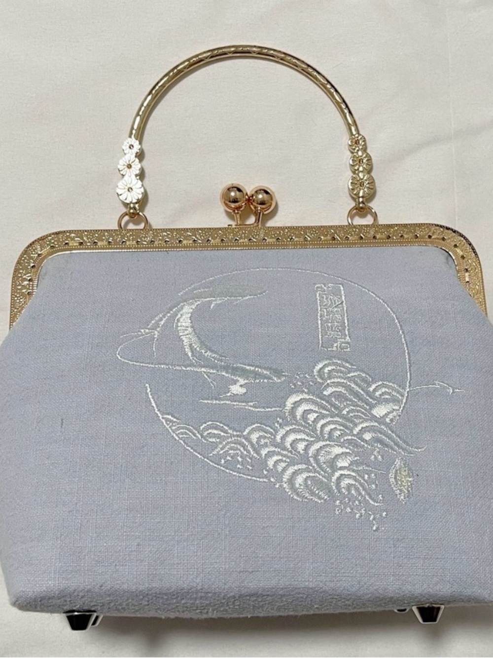 Elegant Light Blue Embroidered Satin Clutch with Gold Frame